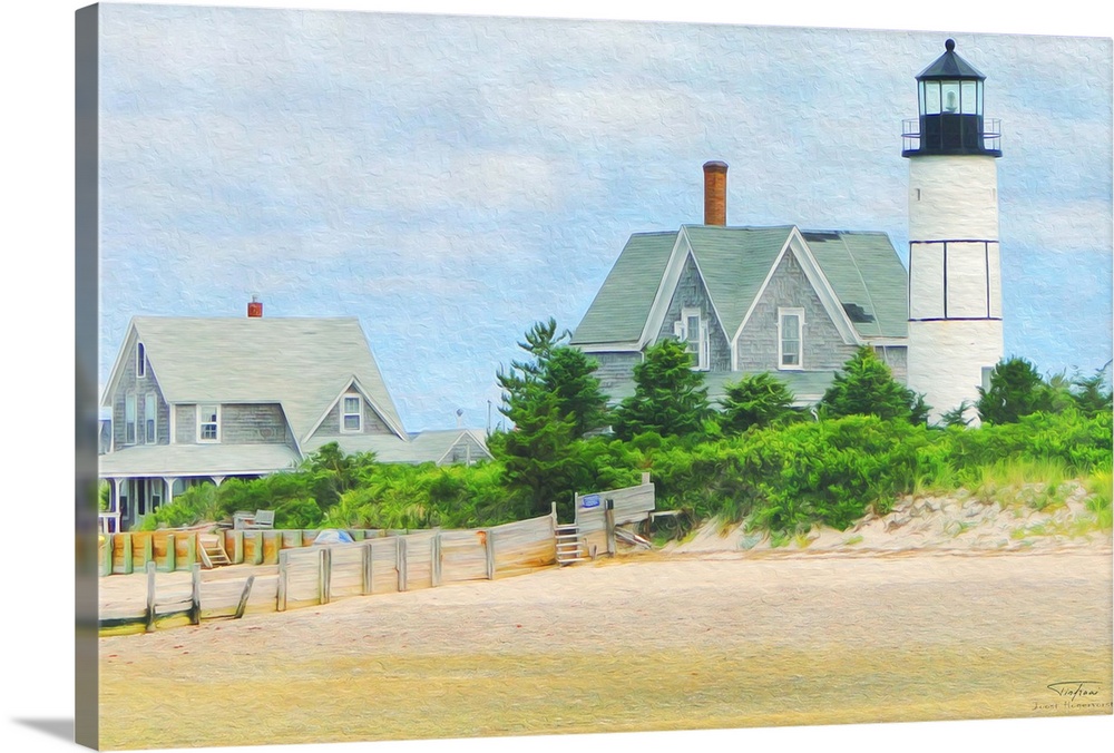 A lighthouse on the edge of a sandy beach in New England.