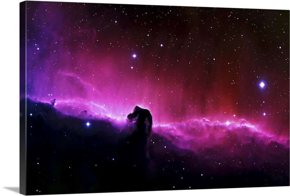 Big wall art of a brightly colored nebula in the solar system with clouds that look like a horse's head.