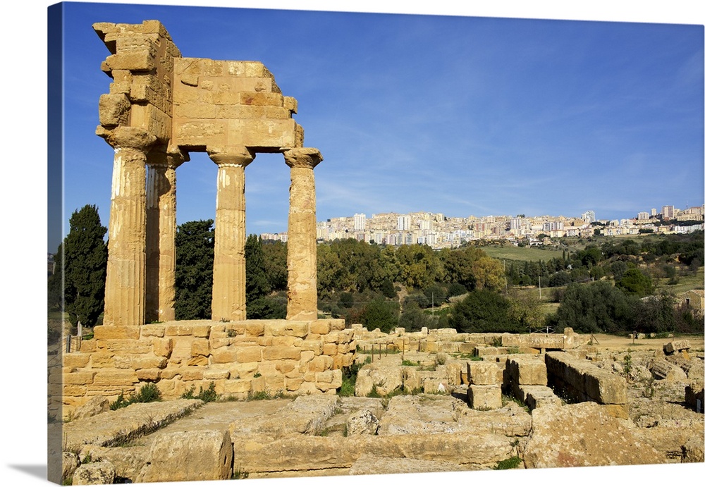 Agrigento Greek ruins, modern city in the background, Sicily, Italy.