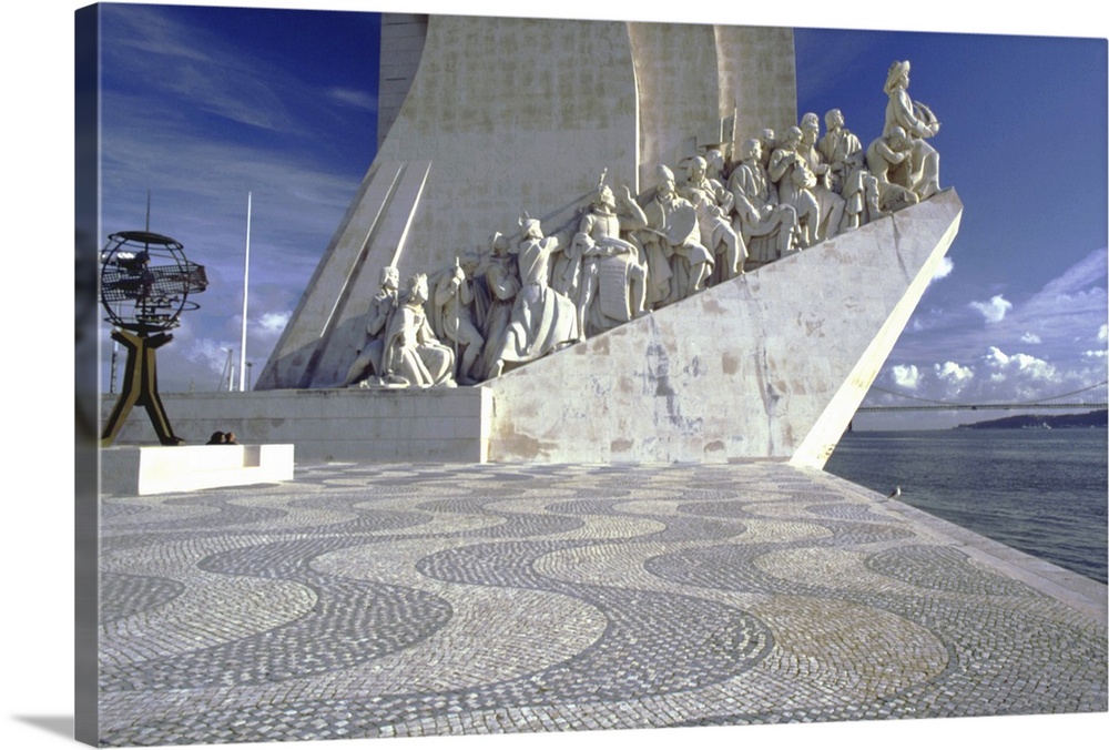 Portugal, Lisbon, Belem: Monument to Discoveries features 33 figures; suspended bridge April 25 in the background; river T...