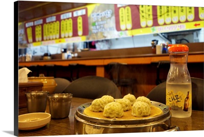 Dumplings and a drink at a Restaurant in South Korea