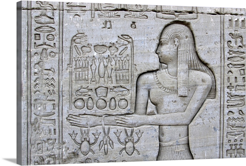Temple of Denderah, Queen Cleopatra: human figures and hieroglyphics carved in the stone: offerings