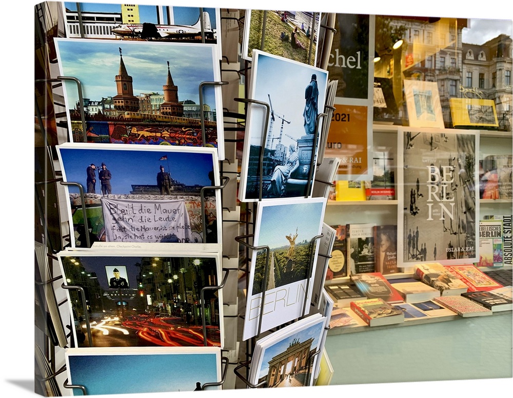 Germany, Berlin. Postcards rack outside a local bookstore.