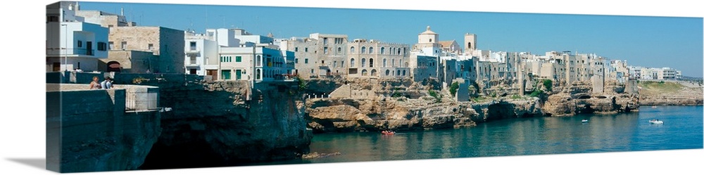 Italy, Apulia, Polignano a Mare. Old village is walled and built over the cliff