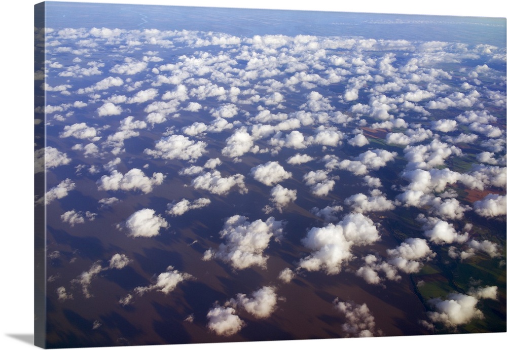 Scattered clouds, aerial over Rio de la Plata, Argentina.