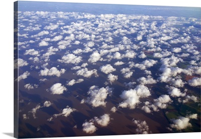 Scattered clouds, aerial over Rio de la Plata, Argentina
