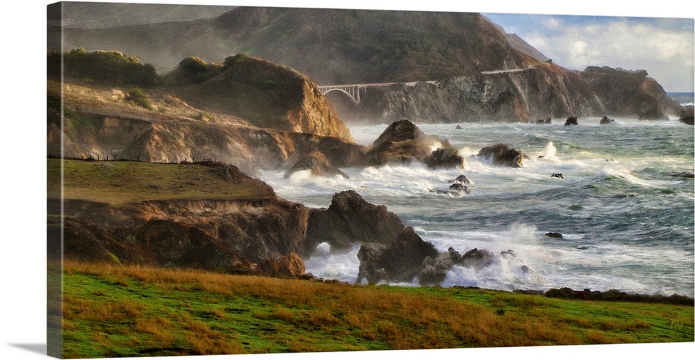A breathtaking panorama of the Big Sur coastline between Rocky Point and the distant Rocky Creek Bridge. Winter waves surg...
