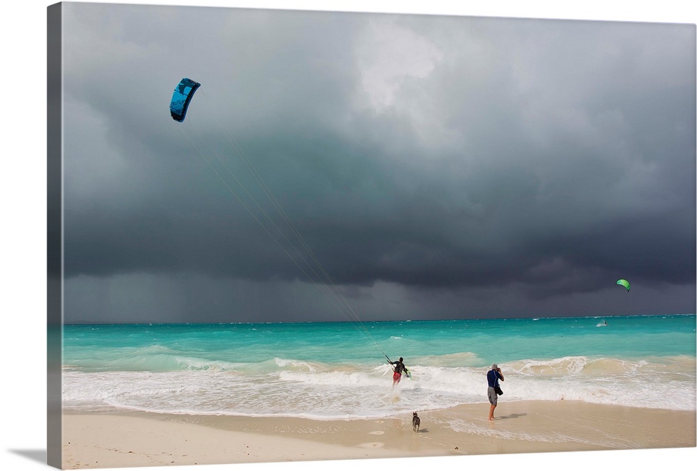 A kiteboarder enjoying gusty winds created by Hurricane Tomas.