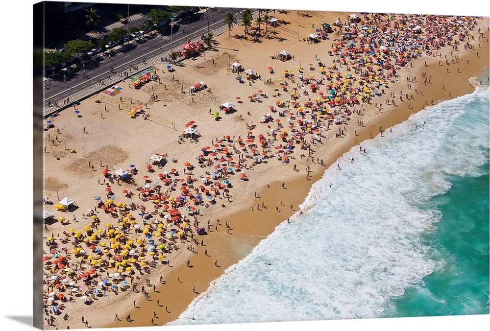 Aerial of large crowd at the Copacabana Beach in Rio de Janeiro.