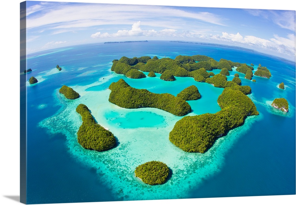An aerial fisheye lens view of Palau's Rock Islands in the turquoise waters of the Pacific Ocean.