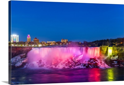 American Falls illuminated at dusk by colorful lights