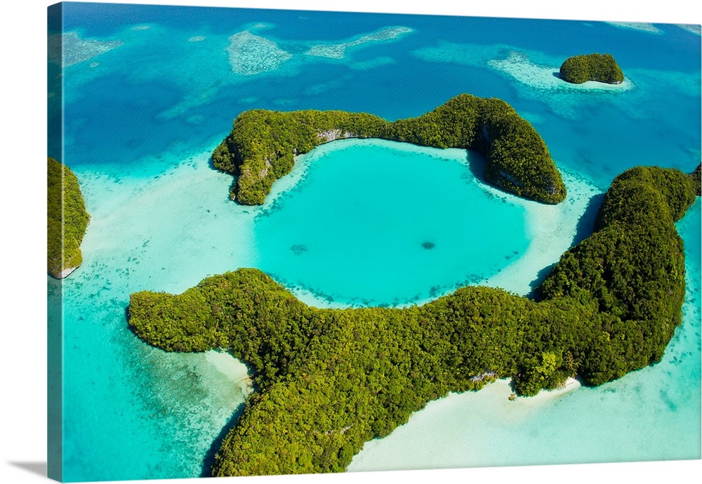An aerial view of Palau's Rock Islands in the turquoise waters of the Pacific Ocean.