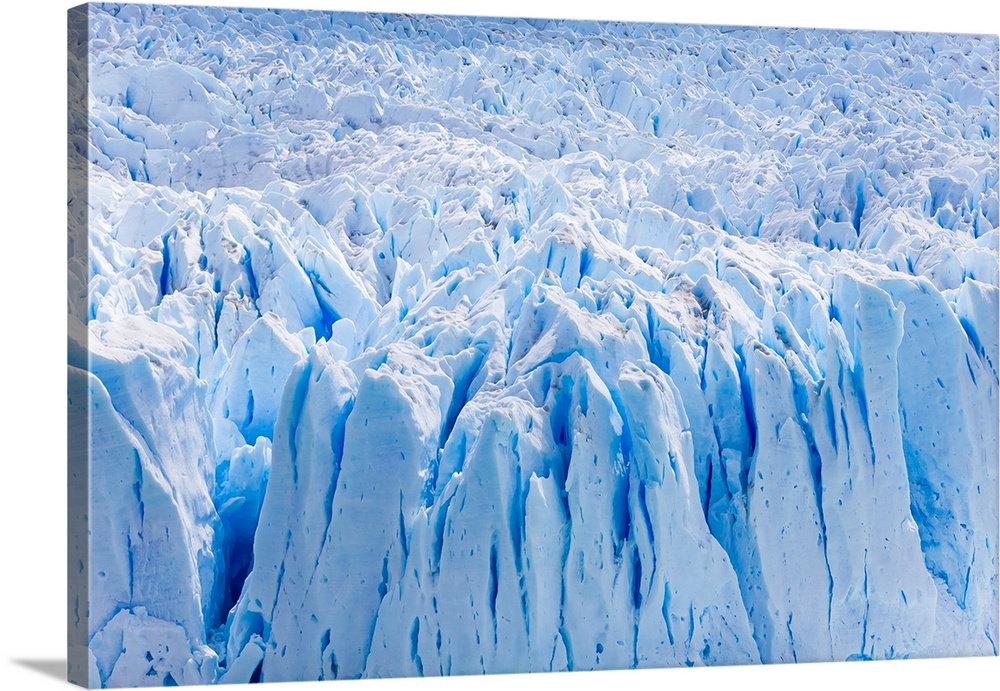 Deep blue cracks on the front wall of the Perito Moreno glacier in Los Glaciares National Park.