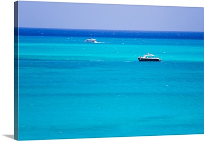 Boaters enjoying the turquoise waters of Grace Bay, in the Turks and Caicos Islands