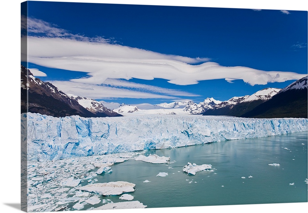 Perito Moreno glacier wall and floating ice that broke off the wall.