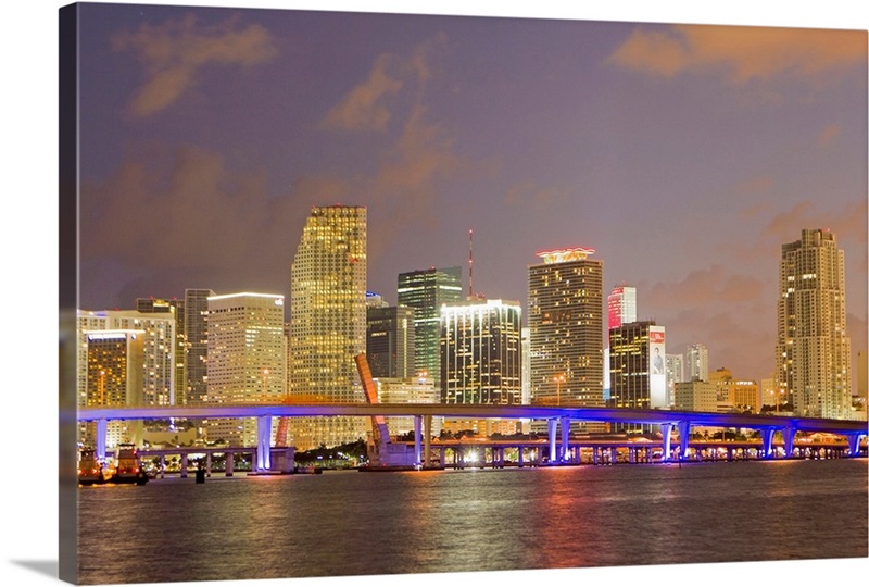 The Miami causeway and skyline at night | Great Big Canvas