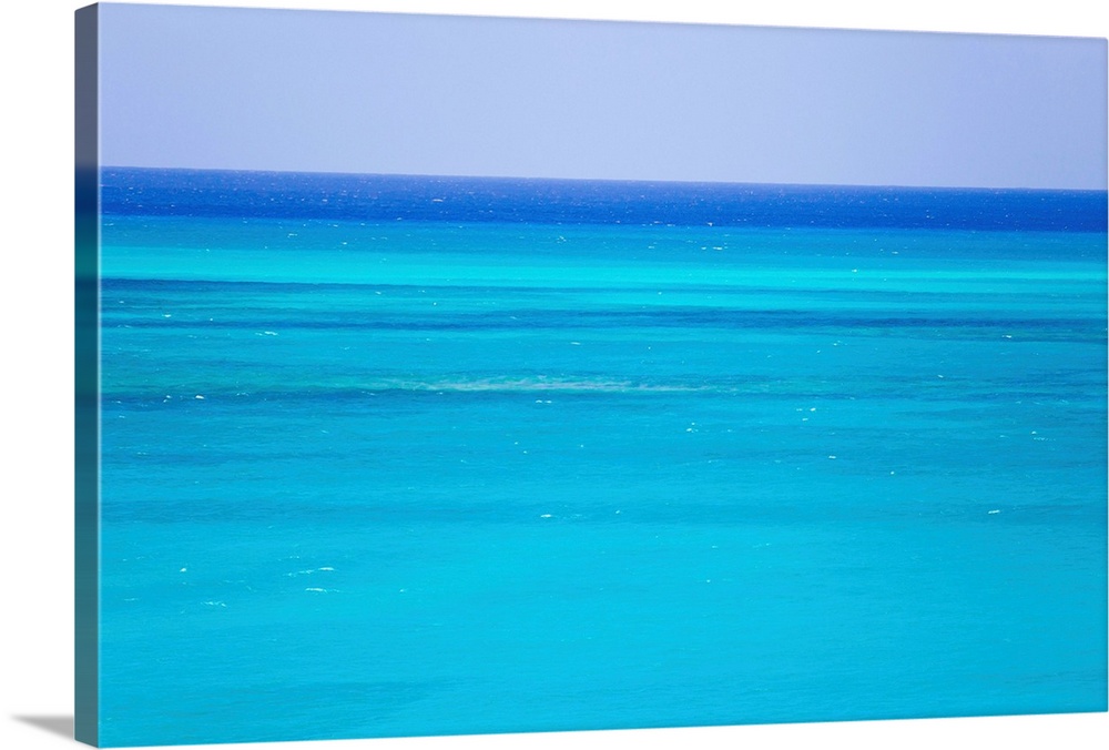 The turquoise waters of Grace Bay, and the Atlantic Ocean beyond.
