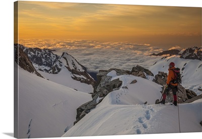 Climber with Douglas Peak and Fox Glacier, Westland Tai Poutini, New Zealand