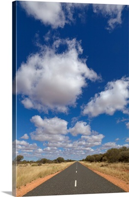 Cumulus Clouds and Desert Road in Northern Territory Australia