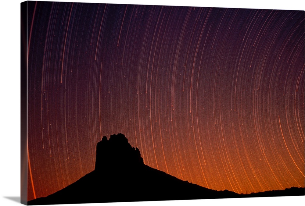 Startrails over Shiprock in the four corners region of the Southwest, New Mexico