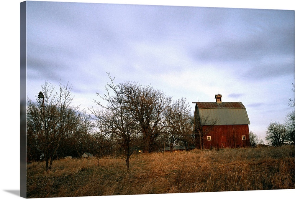 A red barn on a homestead farm in Nebraska Wall Art, Canvas Prints