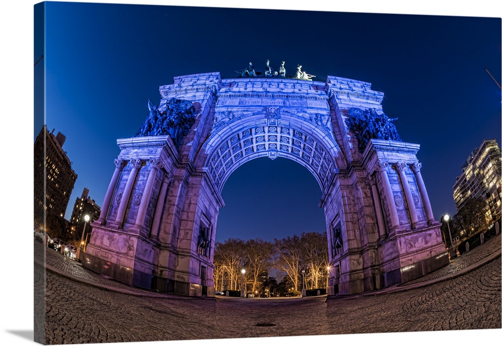 A photograph using a fisheye lens to capture an interesting ground level view of the Soldiers and Sailors Arch in NYC.