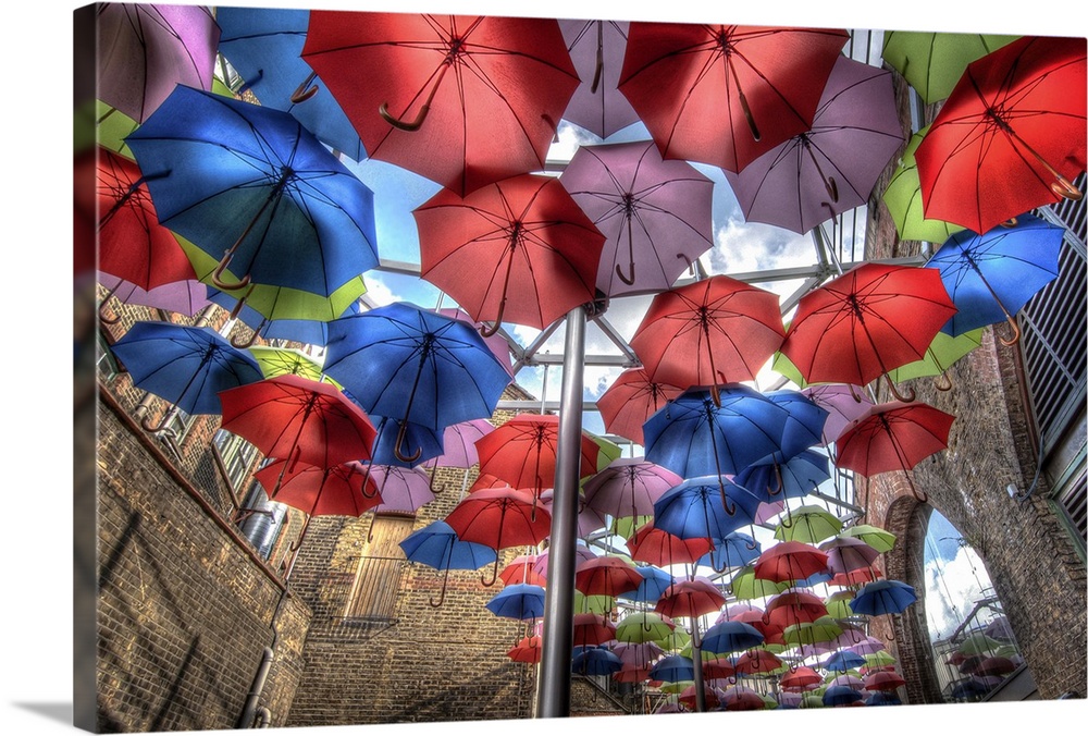 HDR photograph of a hanging umbrella installation art piece, London.