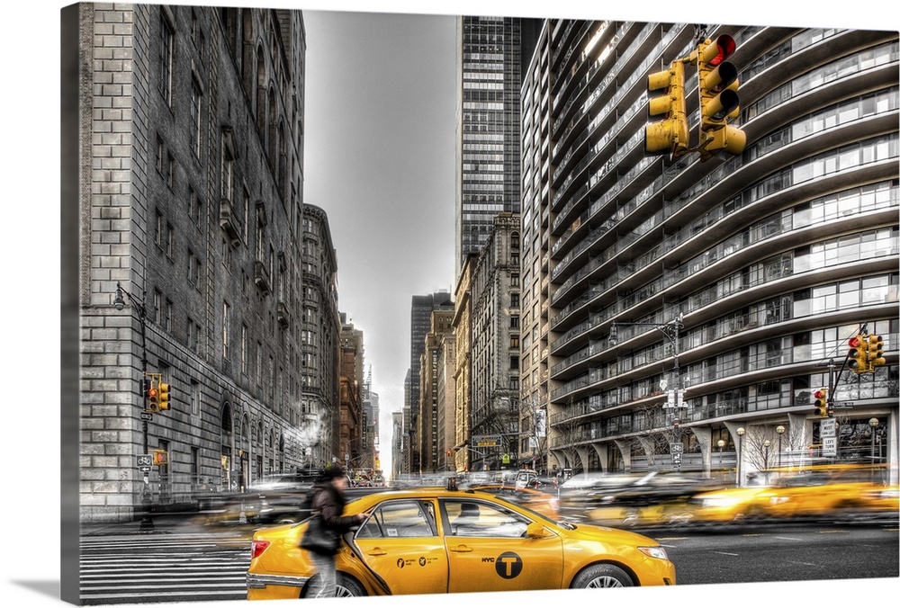 HDR photograph of a stopped yellow taxi in New York city.