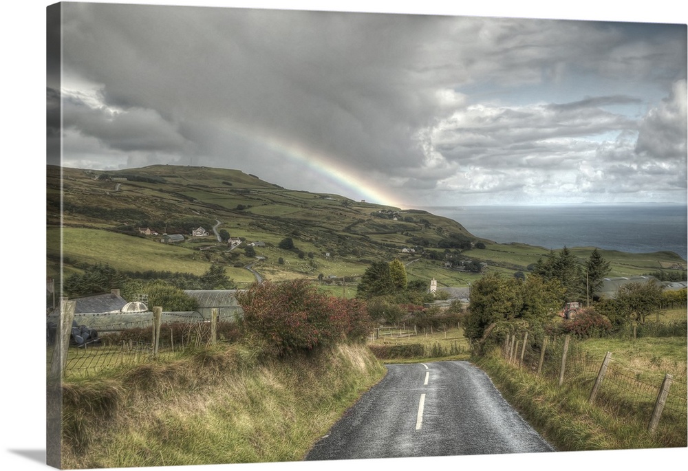 A photograph looking down the road of a countryside landscape in Northern Ireland.