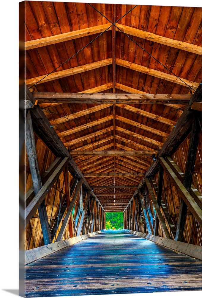 Wooden beams and ceiling of a covered bridge in the Adirondacks, New York.