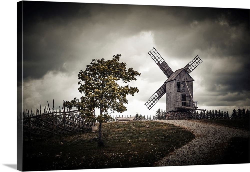 An old windmill in a contrasting landscape