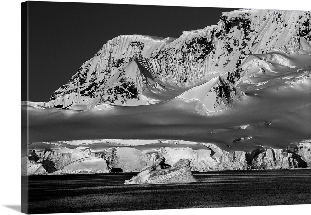 Black and white photograph of the cold and lifeless looking landscape of Antarctica.