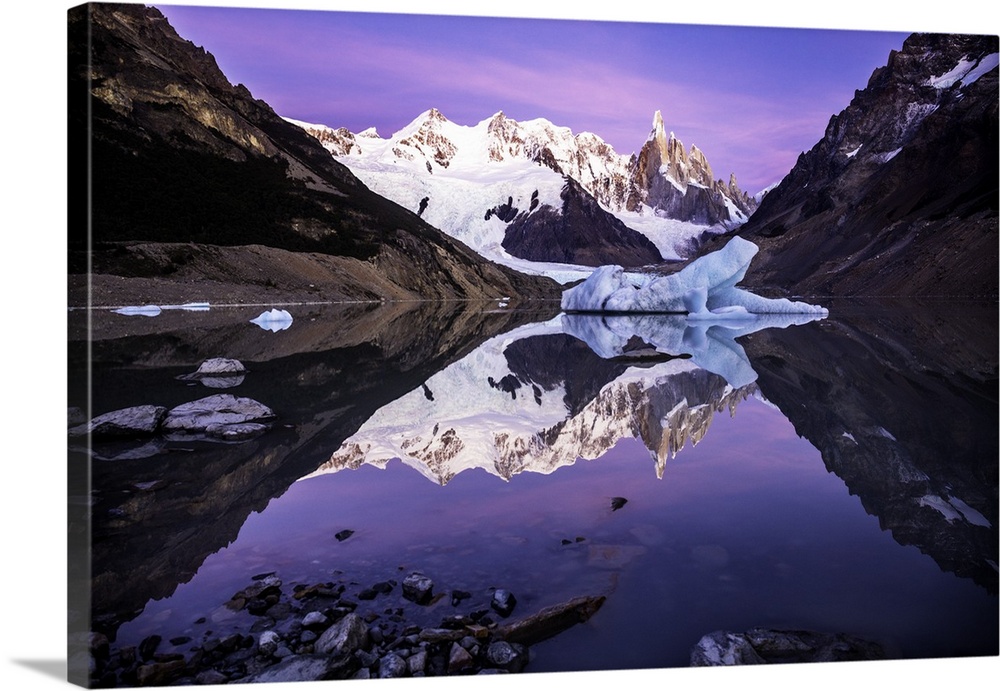 A glacier at the edge of a lake at the bottom of the Andes mountains in Argentina.