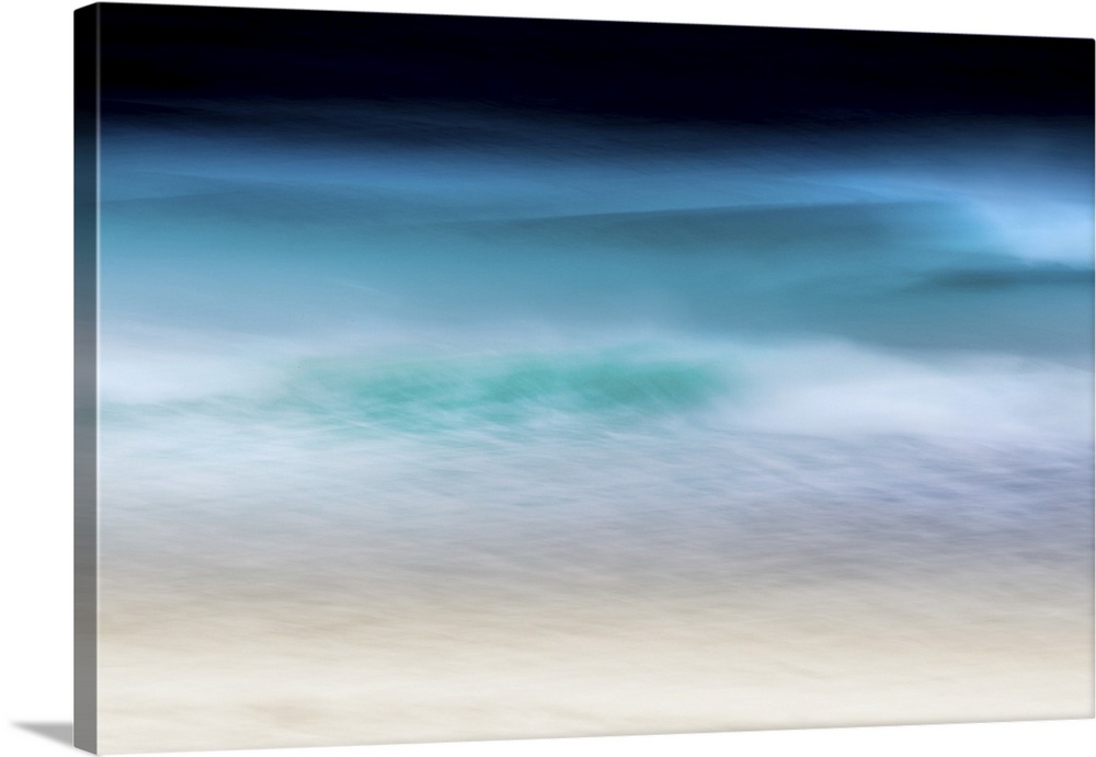Abstract seascape of teal waves breaking over soft sand with moody sky.