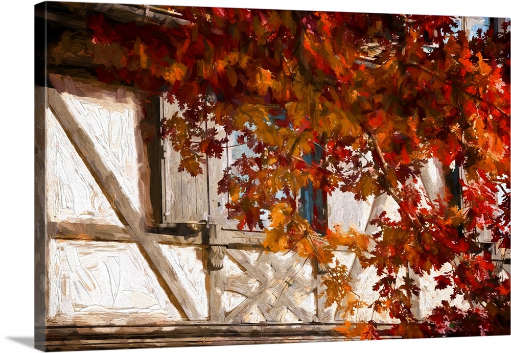 Half-timbered house with a tree in front in the fall. Expressionist photo or Painterly