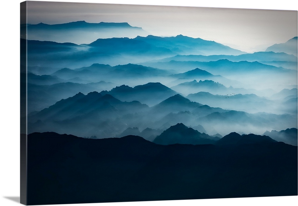Blue mountains with mist taken from the sky, mountains of Asia