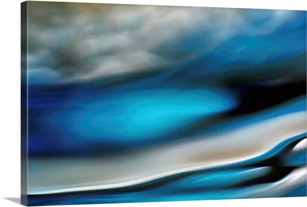 Abstract photo of smooth waves in cool tones.