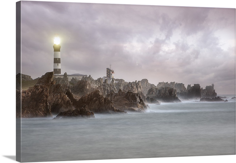 A photograph of a lighthouse on the coast of France.