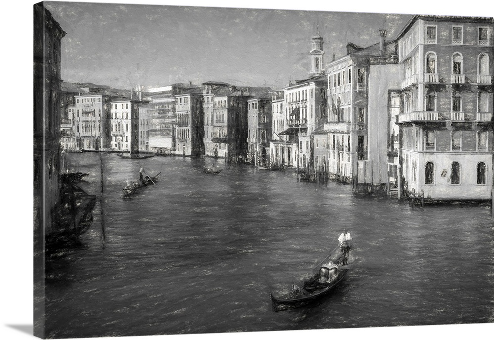 Fine art photo of a gondola in a canal in Venice, in black and white.