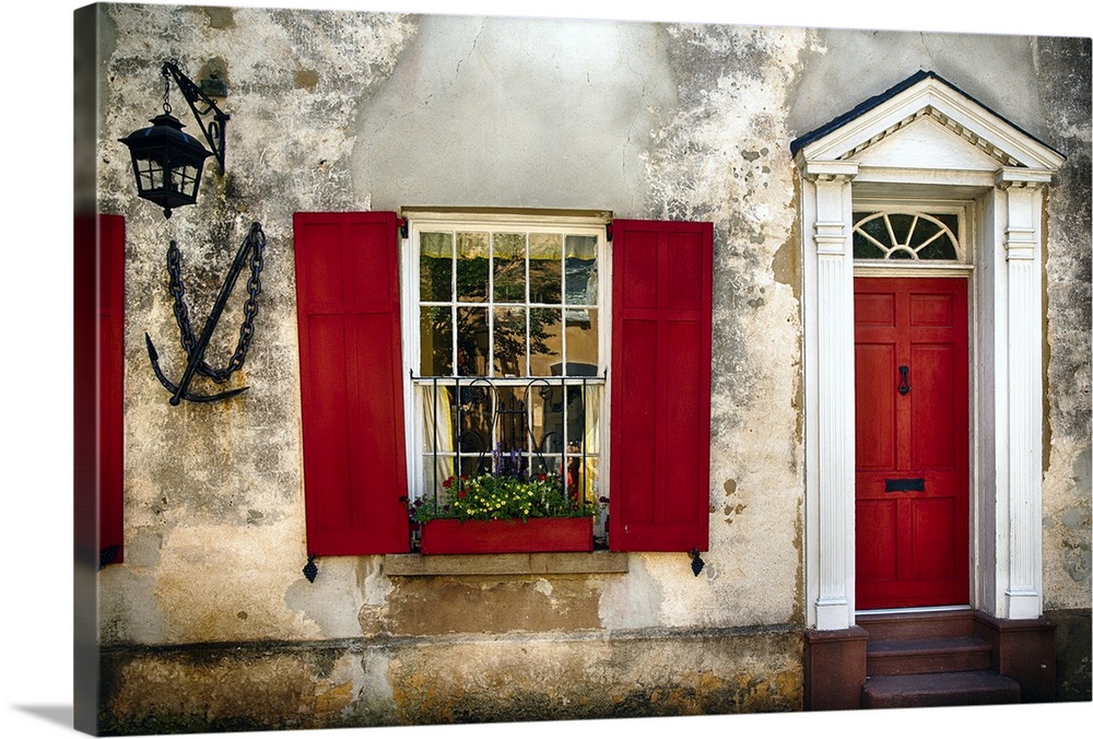 Entrance View of a Historic House in Charleston, with Bright Red Door