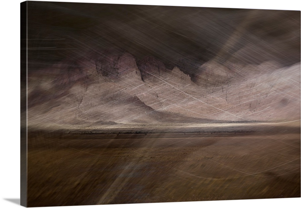 Abstract image of a desert storm with thin lines on top creating movement and a rocky textured background.