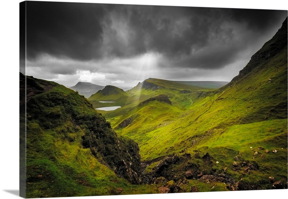 Fine art photo of a lush valley under a stormy sky.