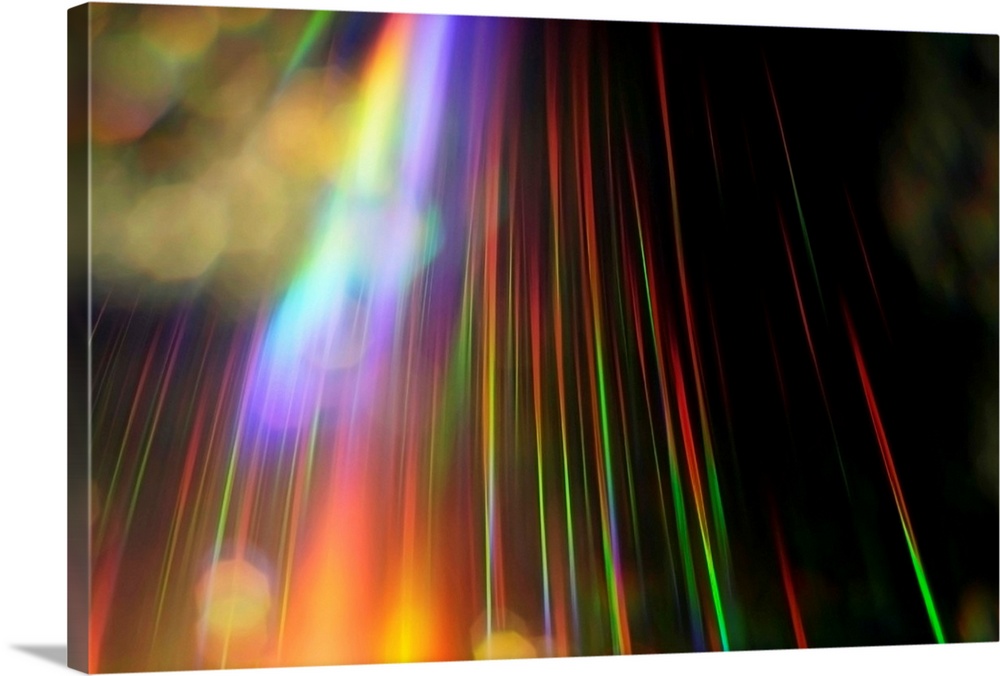 An abstract piece with a rainbow of colors streaking vertically on the print against a black background.