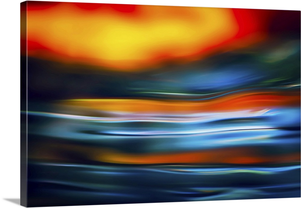 Studio shot of water reflecting colors. This is an abstract representation or impression of a dramatic sunset, when it loo...