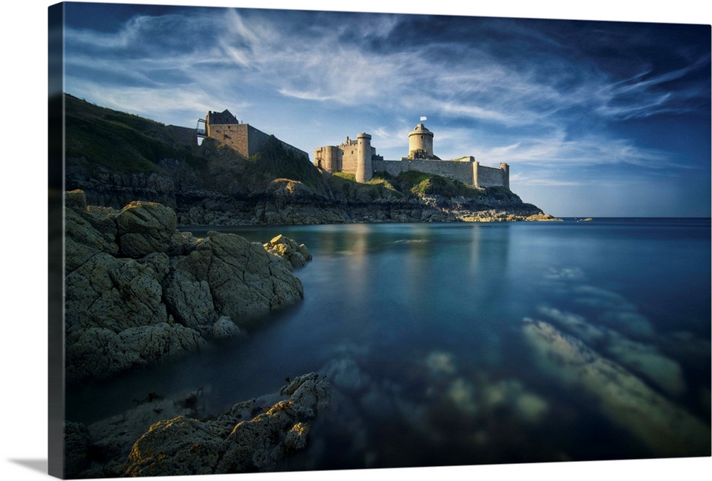 Classical view of a castle facing the sea and the rock, the place of Fort la Latte, in Brittany in France.