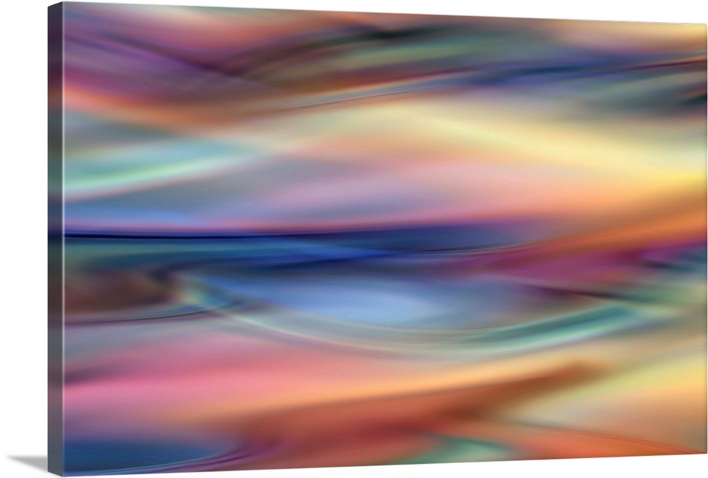 Abstract artwork of flowing colorful tones that have been blended to create subtle ripples.