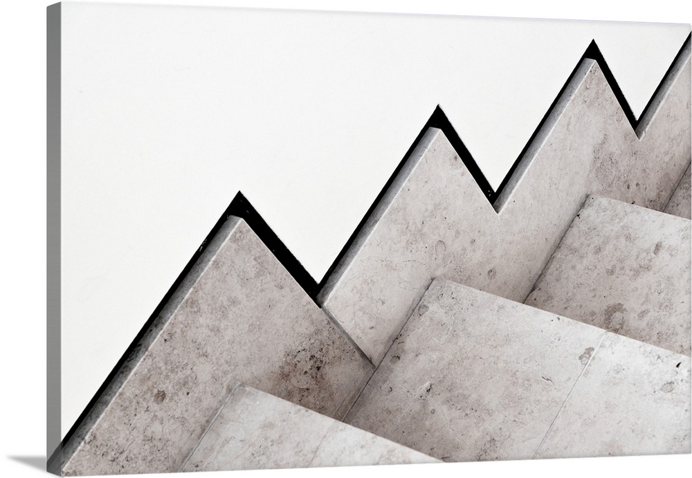 Concrete stairs and white wall forming an abstract angle.