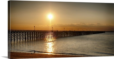 Golden Sunlight over a Wooden Pier