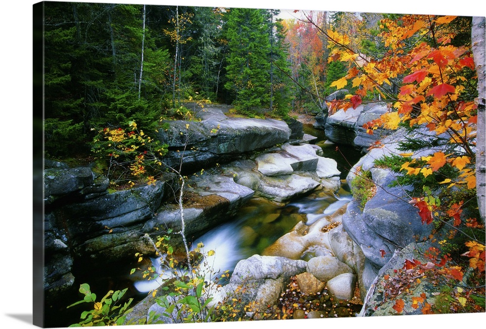Granite rocks of Ammonoosuc River in Fall, White Mountains, New Hampshire.