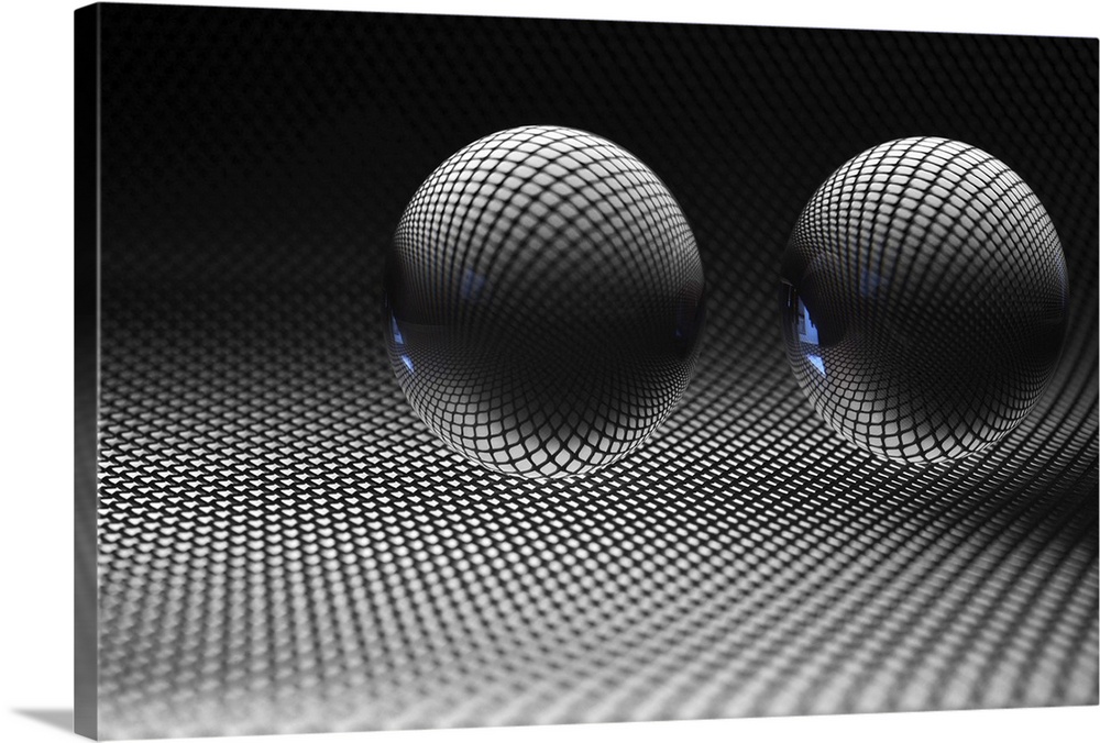 Two glass spheres reflecting a field of small dots.